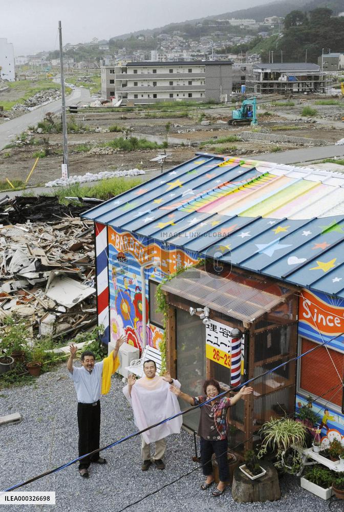 Colorful temporary barber shop in tsunami-hit Ofunato