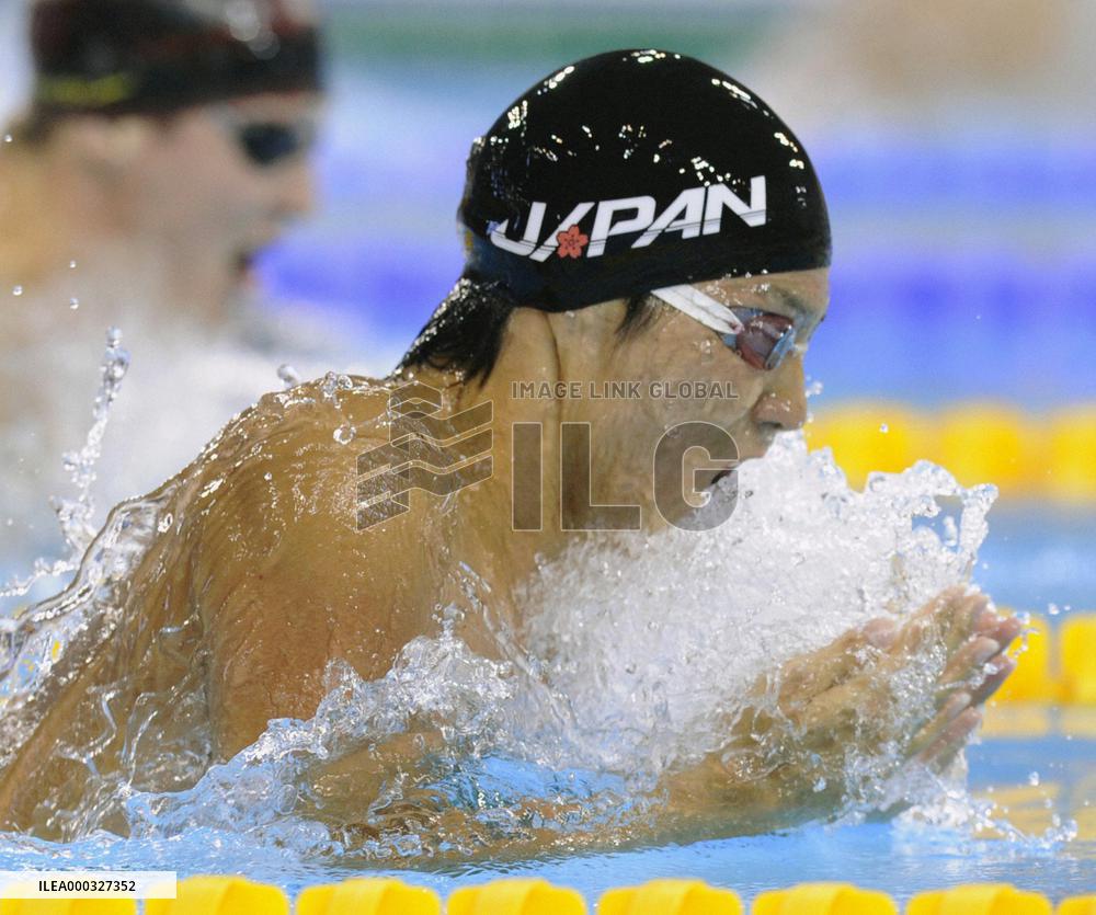 Tateishi strikes 100-meter breaststroke gold