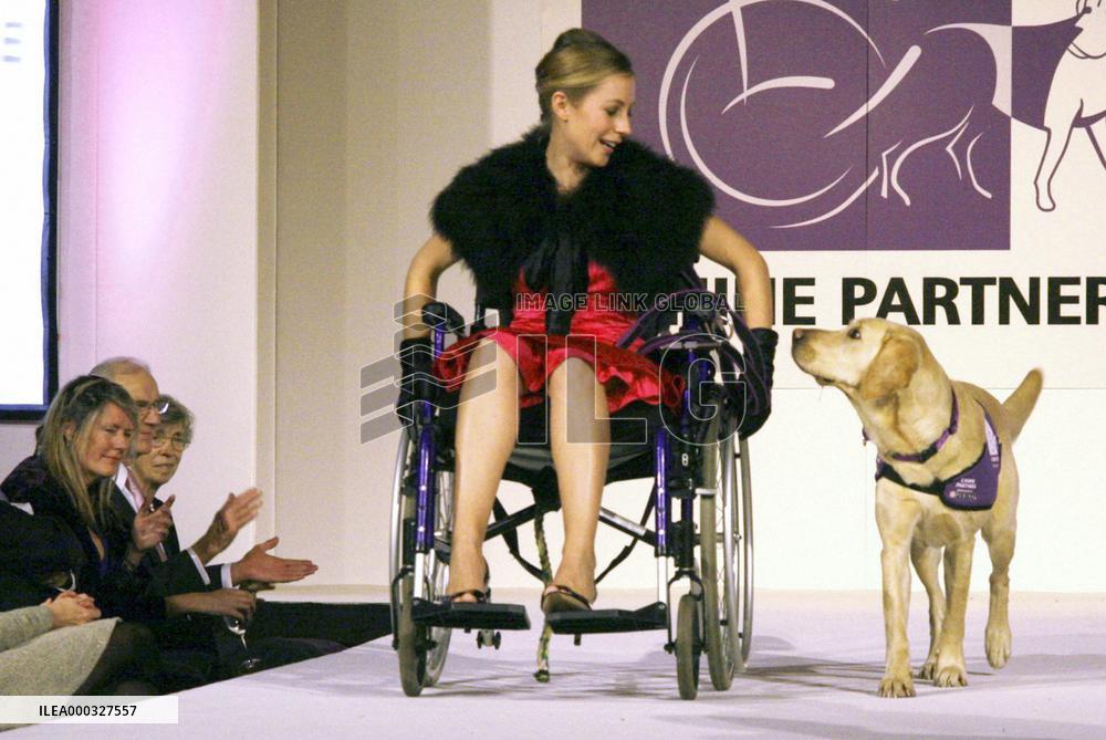 Fashion show with assistance dogs
