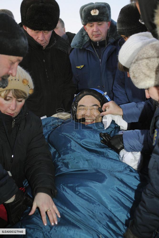 Astronauts return to Earth