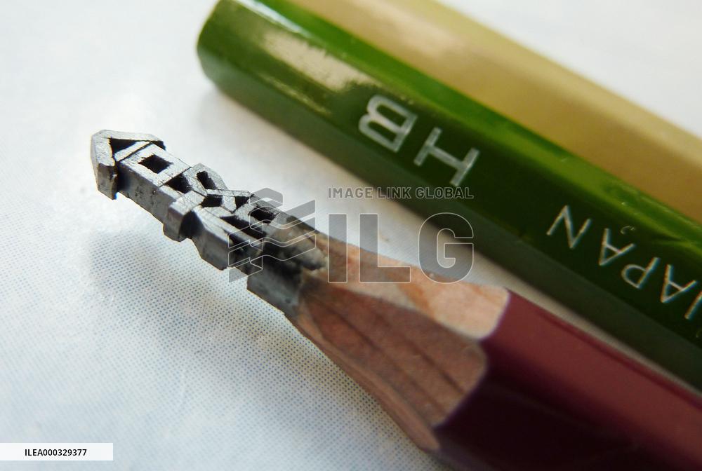 Pencil with sculpted tip