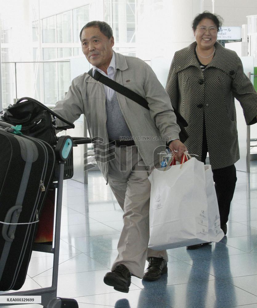 War-displaced man departs Japan
