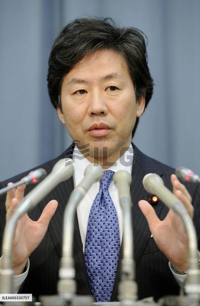 Finance minister Azumi at press conference