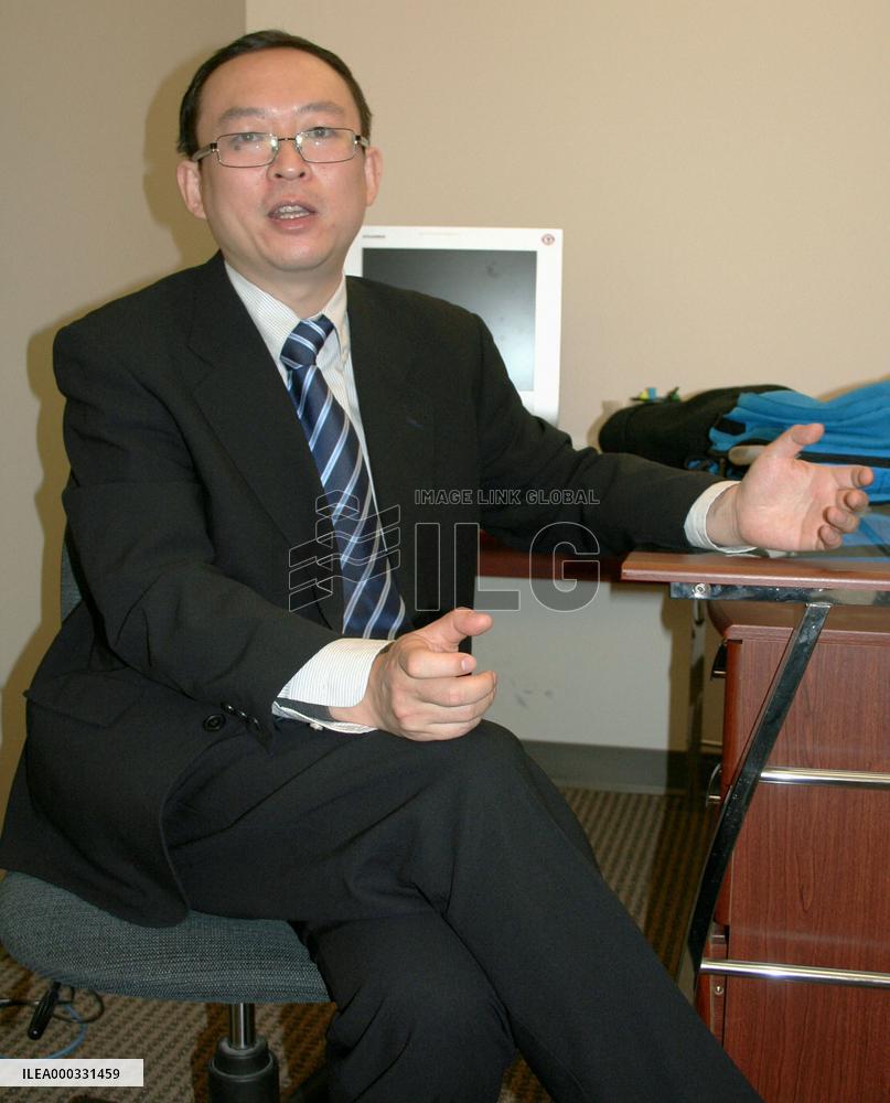 Chinese dissident Yu in interview