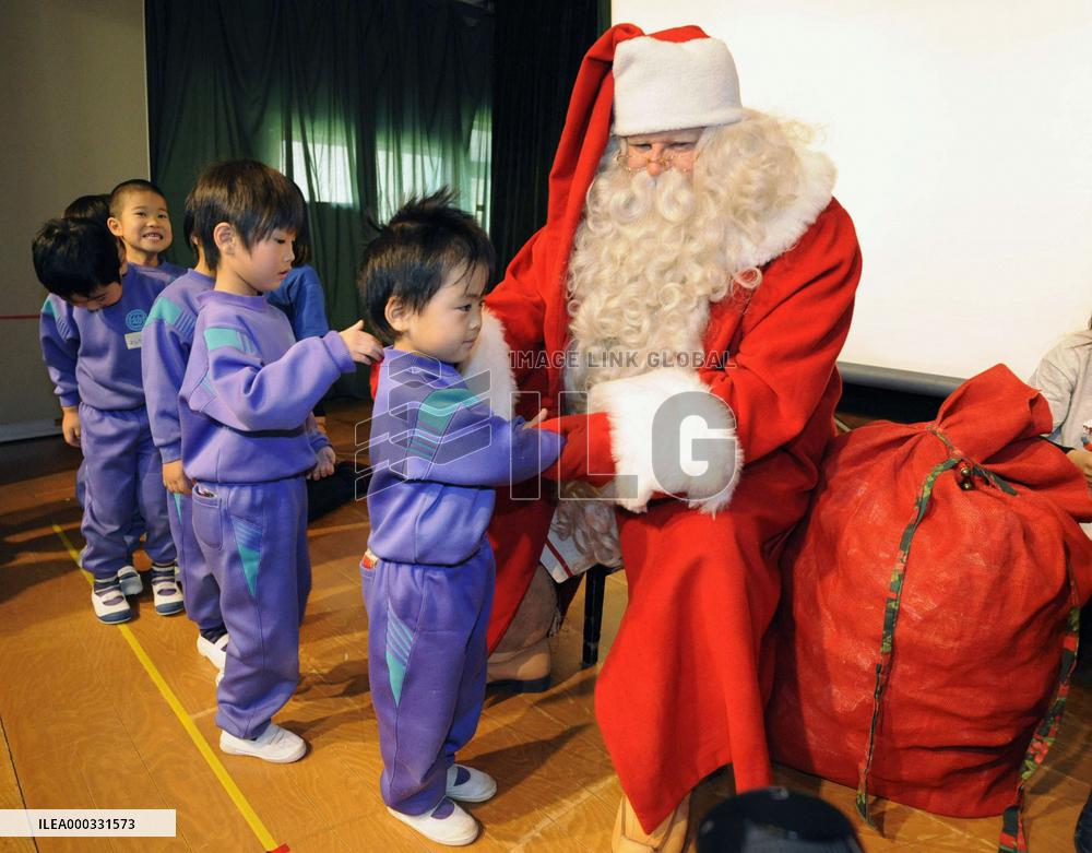 Santa cheers up children in Iwate Pref.