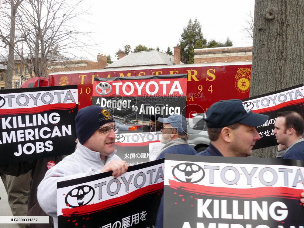 U.S. auto workers' union members stage rally against Toyota