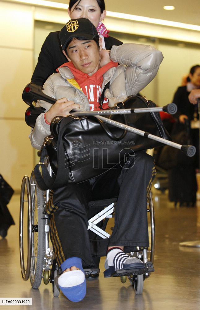 Injured Kagawa returns to Japan