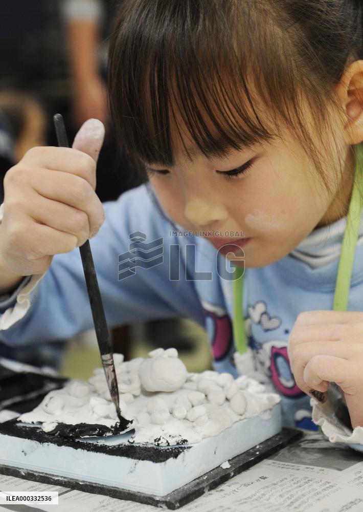Miyagi children create diorama of devastated towns
