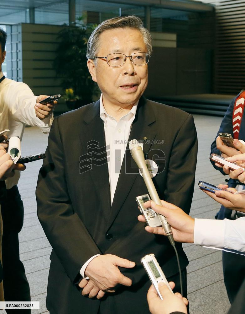 Fukushima Gov. Sato speaks to reporters in Tokyo