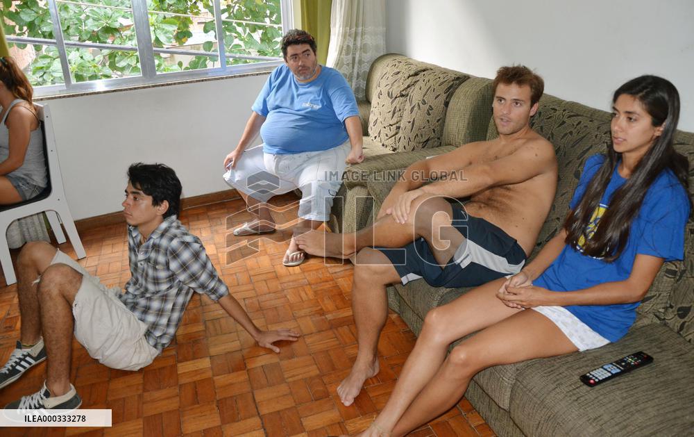 Tourists relax at cheap hotel in favela