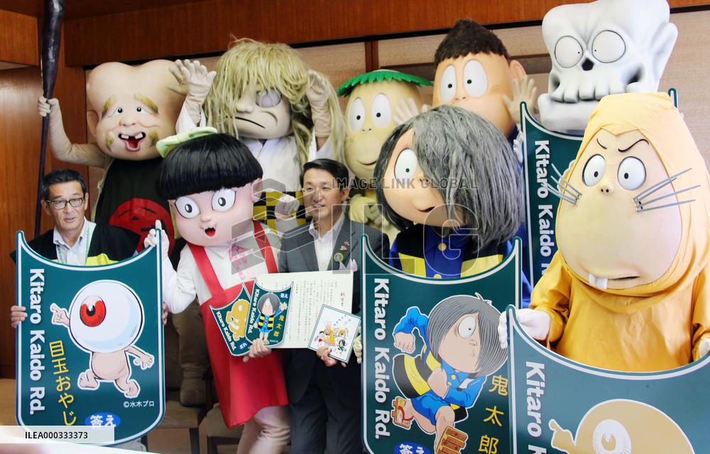 Manga character guide panels in Tottori Pref.