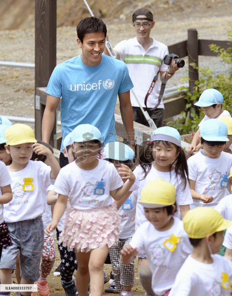 Japan captain Hasebe visits tsunami-hit kindergarten