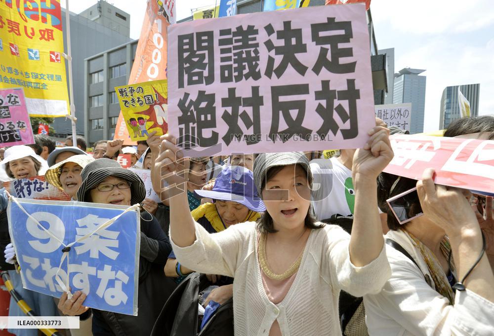 2,000 protest in Tokyo over security policy change
