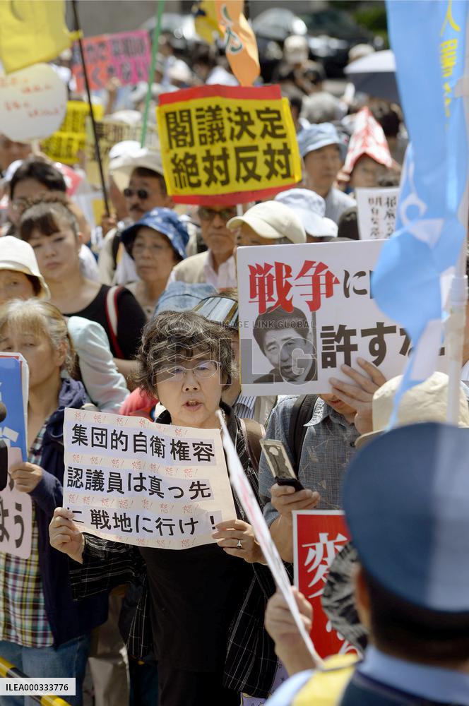 2,000 protest in Tokyo over security policy change