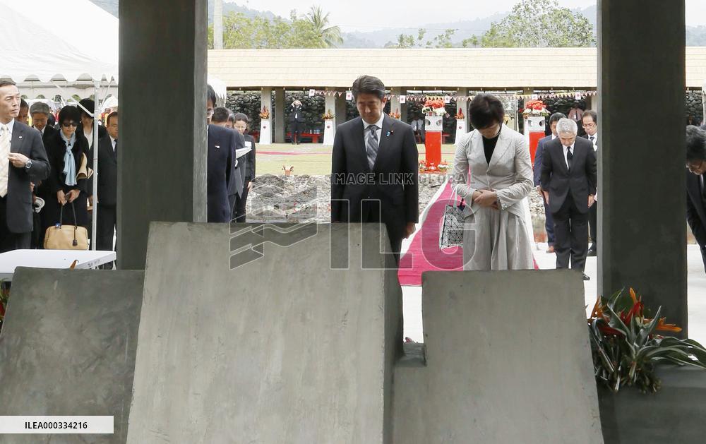 Japan PM Abe visits war memorial in Papua New Guinea