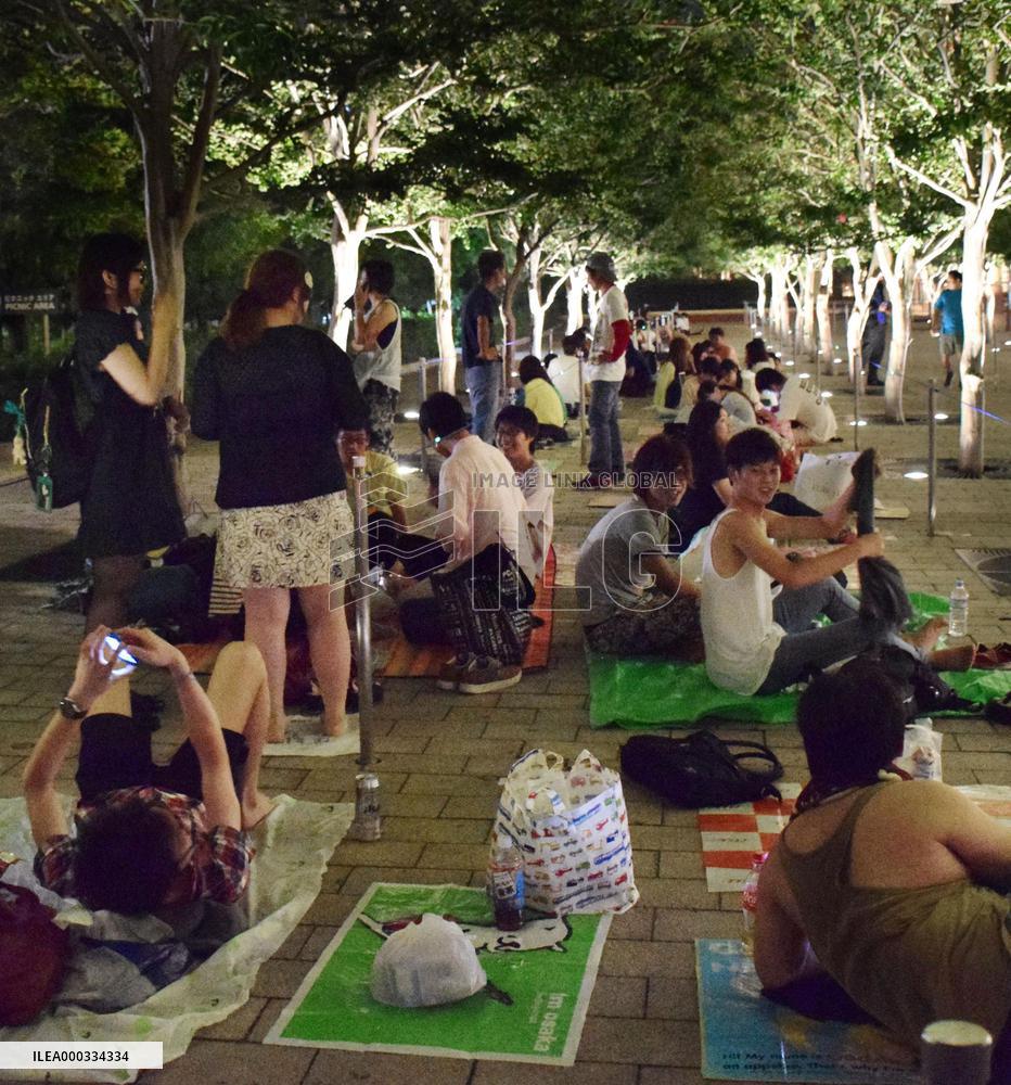 Waiting through night for opening of Harry Potter attraction