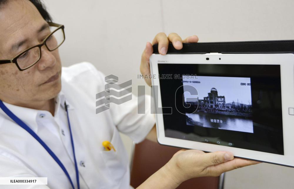 Tourist info service shows pre-, post-A bombed Hiroshima