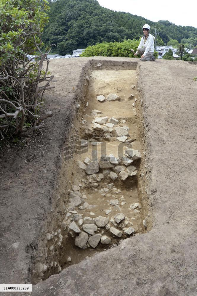 Stones found piled up in staircase pattern at tumulus