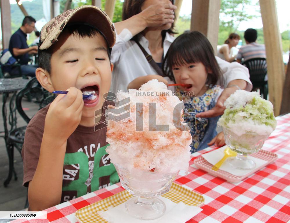 Kids enjoy shaved natural ice in Nikko, Japan