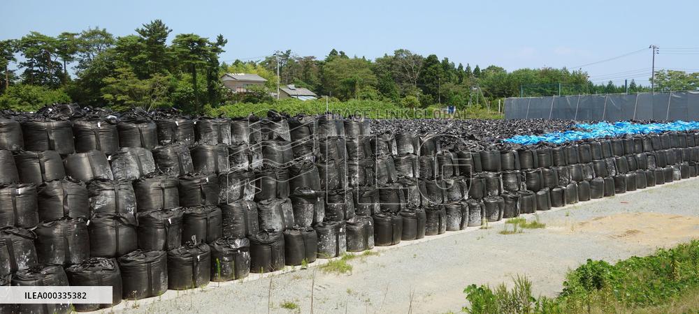 Bags of radioactive waste from cleanup work getting torn