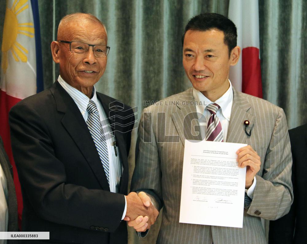 Japan, Philippine lawmakers vow to solve sea disputes