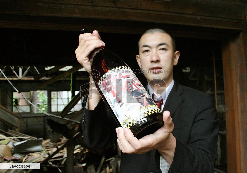 Quake-damaged sake brewer vows comeback