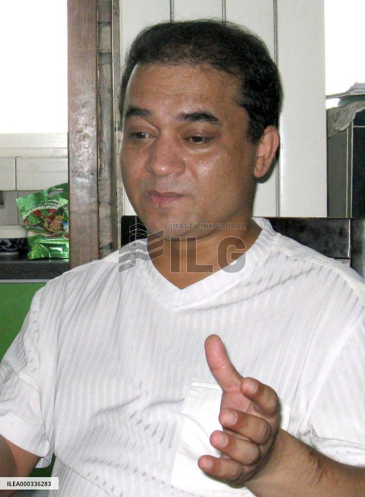 Minority Uyghur scholar accused of separatism goes on trial