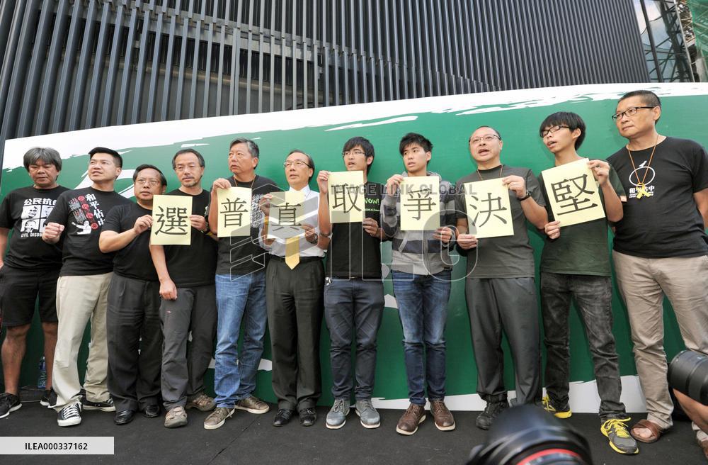 Pro-democracy group threatens protest expansion in H.K.