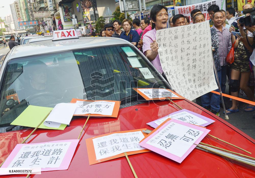 People opposed to pro-democracy protests in H.K.