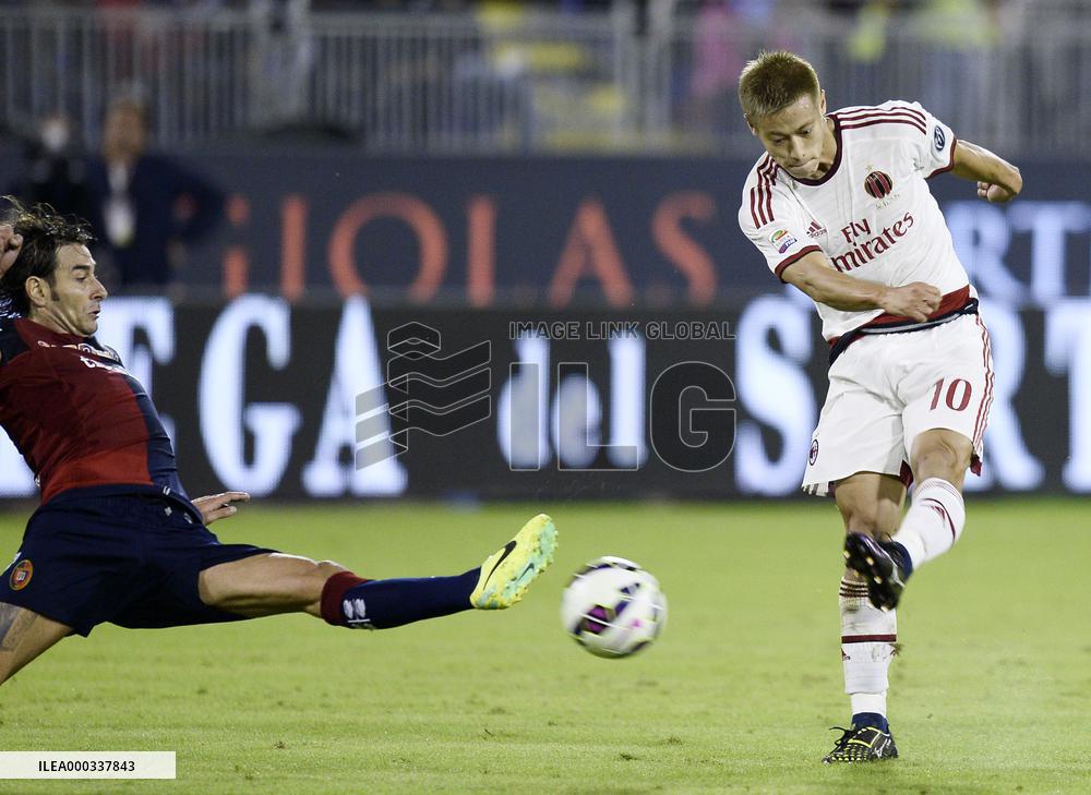 AC Milan striker Honda in action against Cagliari