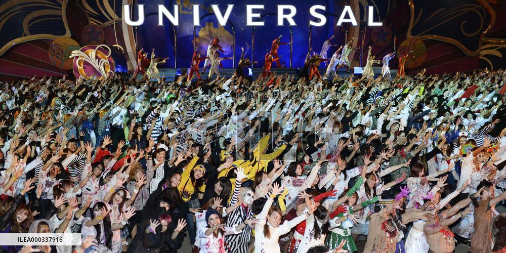 People dance in zombie costumes at USJ's Halloween event