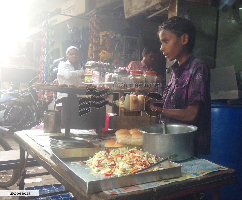 Indian boy works away from home in Mumbai