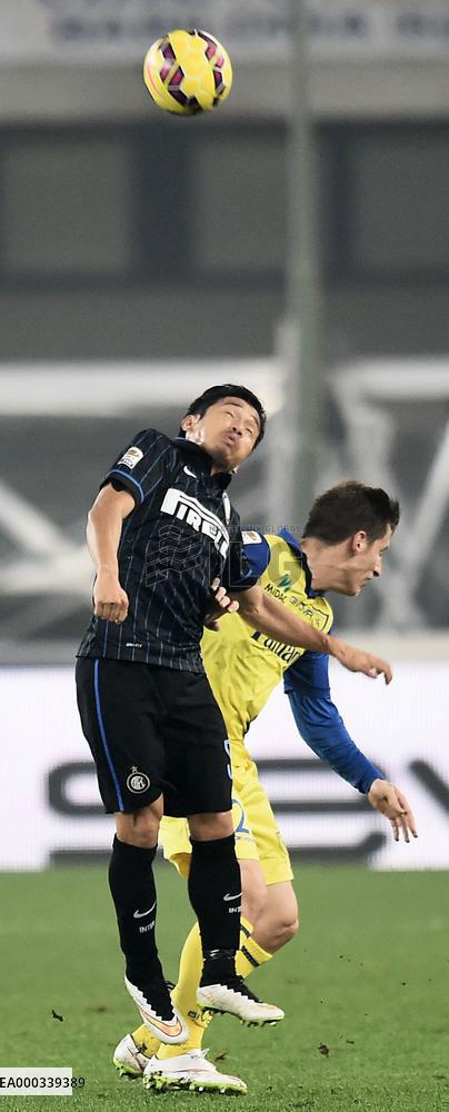 Nagatomo of Milan struggles for header against Chievo