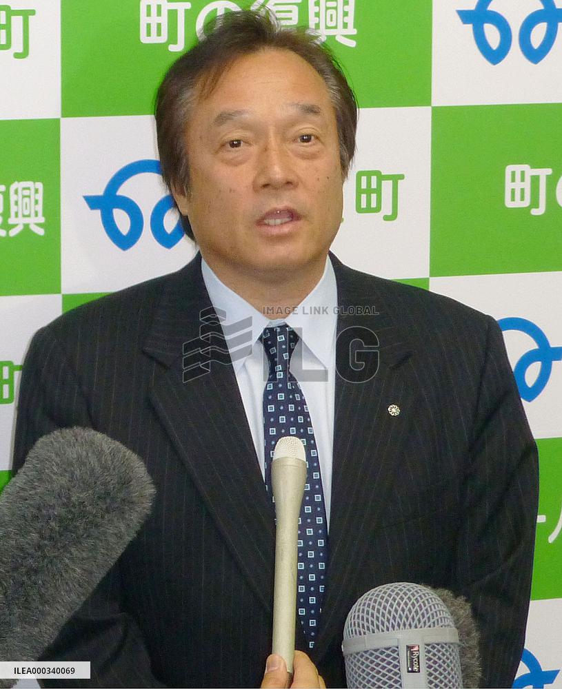 Fukushima town accepts storage of contaminated soil