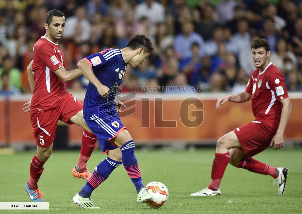 Japan reach quarterfinals in Asian Cup