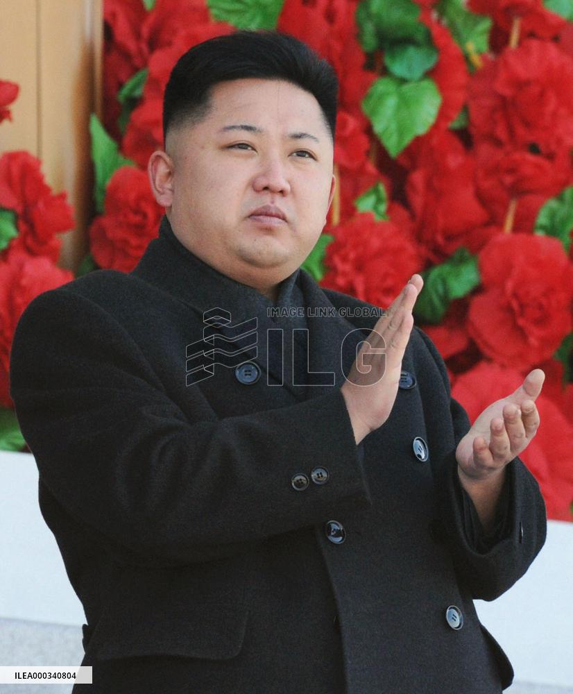 Kim Jong Un reviews military parade