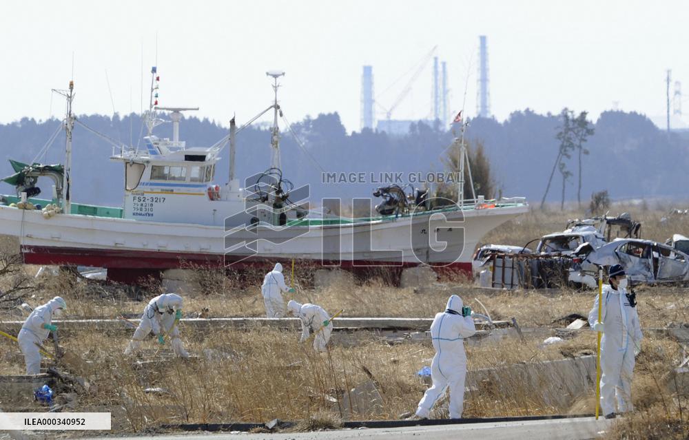 Police search for bodies from 2011 disaster