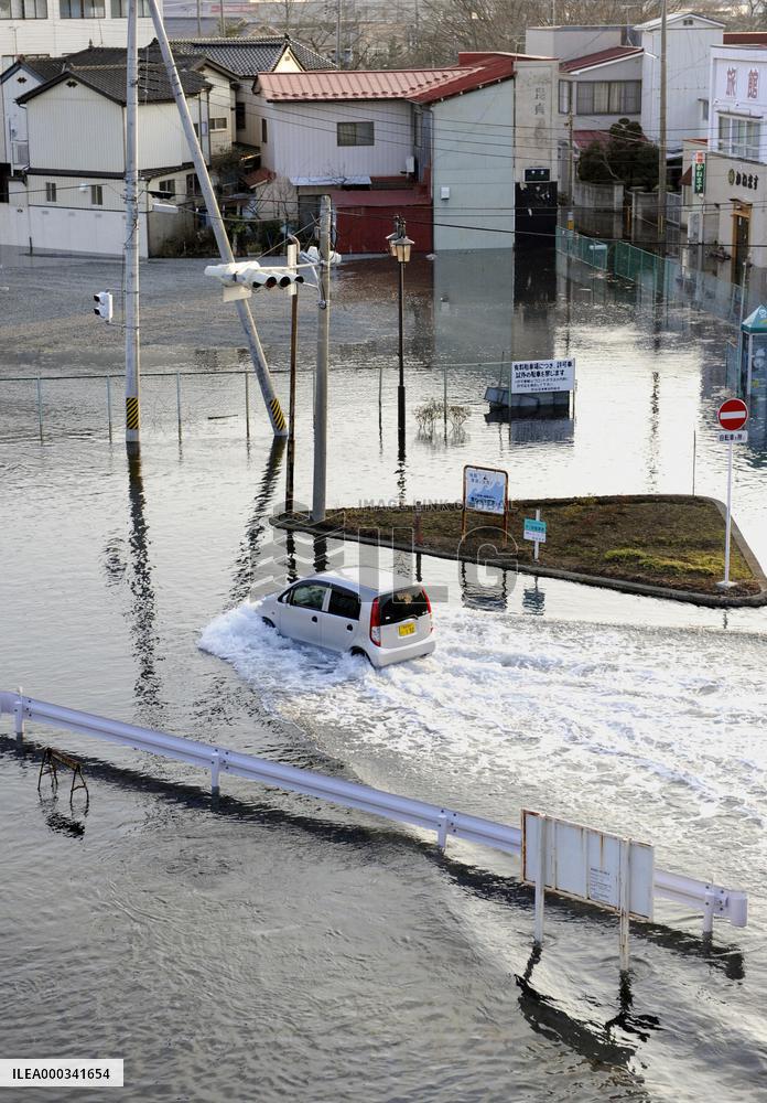 Tsunami reaches Japan's Pacific side