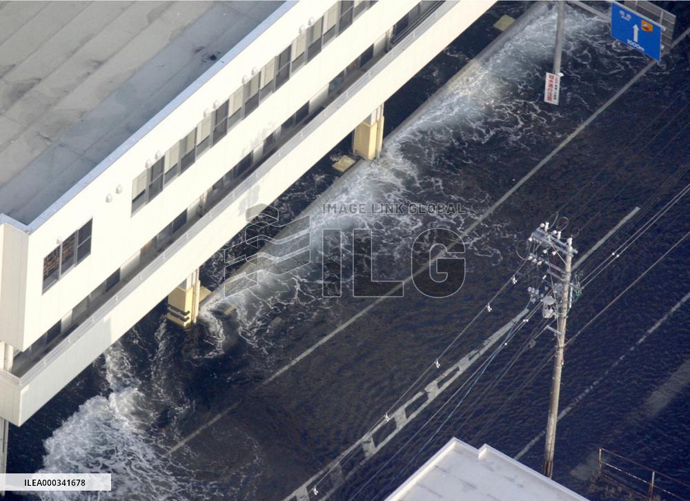 Tsunami reach Japan's Pacific side