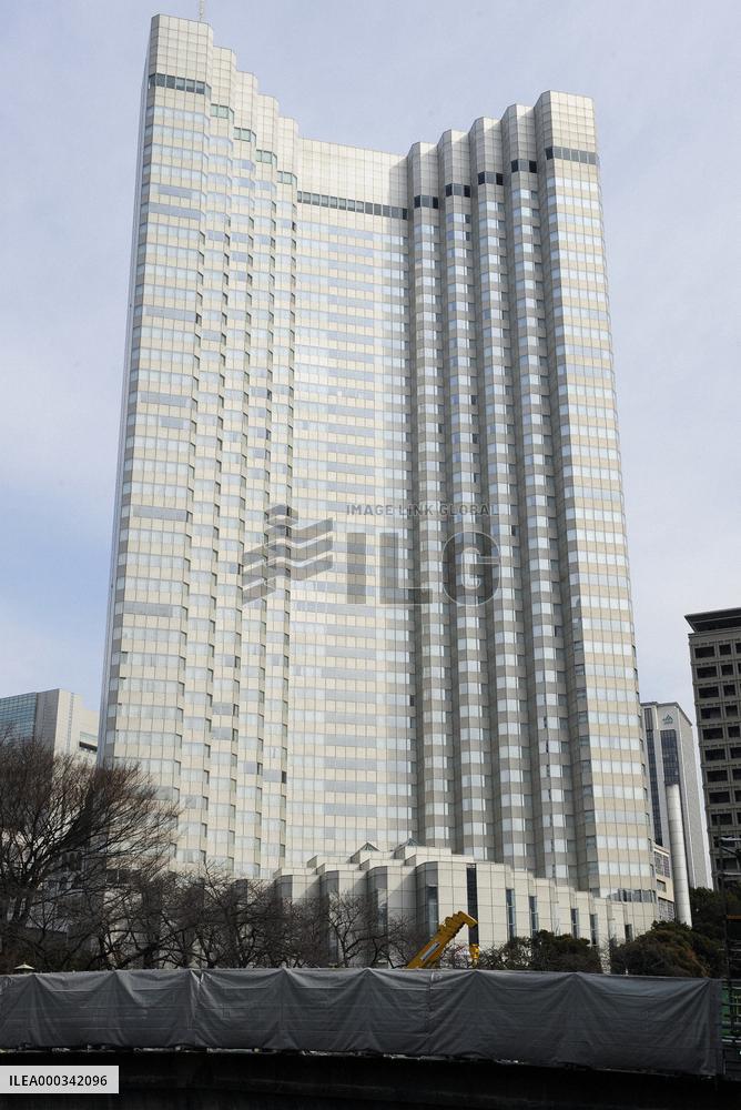 Ex-exec of hotel operator held over fraud