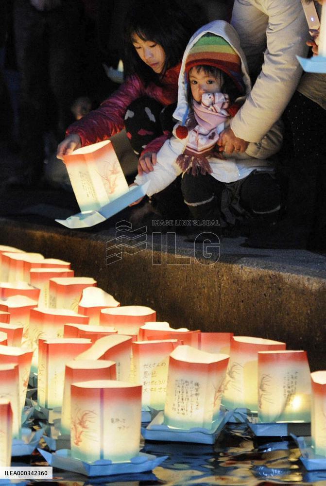 Lantern floating on eve of tsunami anniv.