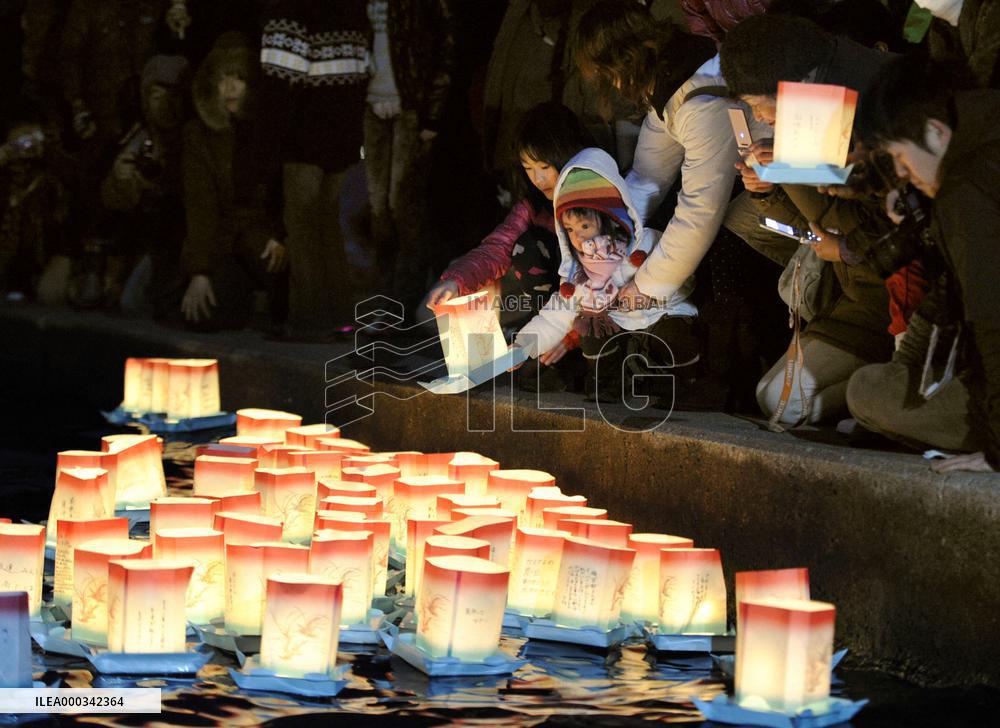 Lantern floating on eve of tsunami anniv.