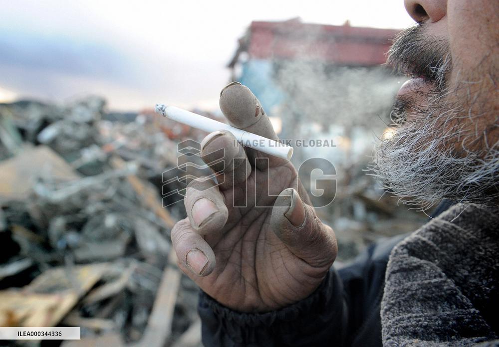 Smoking tsunami survivor