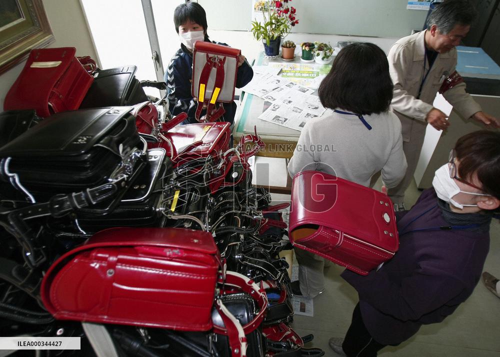 School knapsacks donated to disaster area