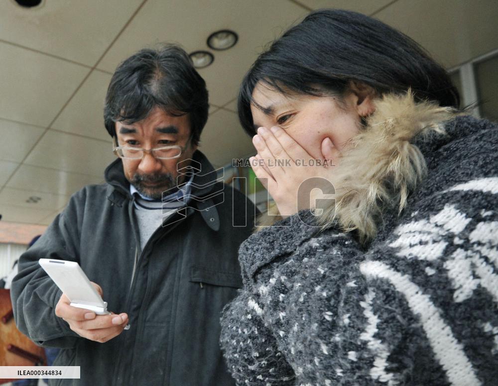Quake victim's parents in Onagawa