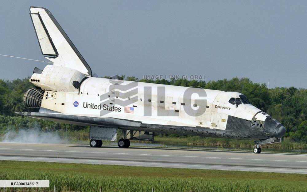 Discovery returns to Earth