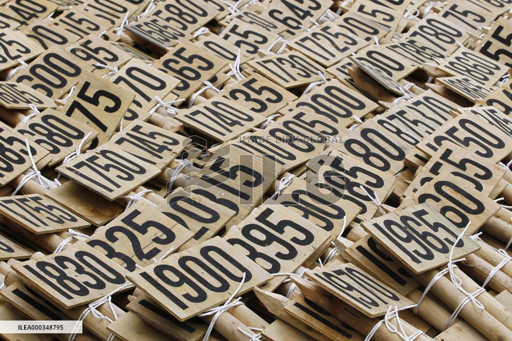 Thousands of number plates used as burial markers
