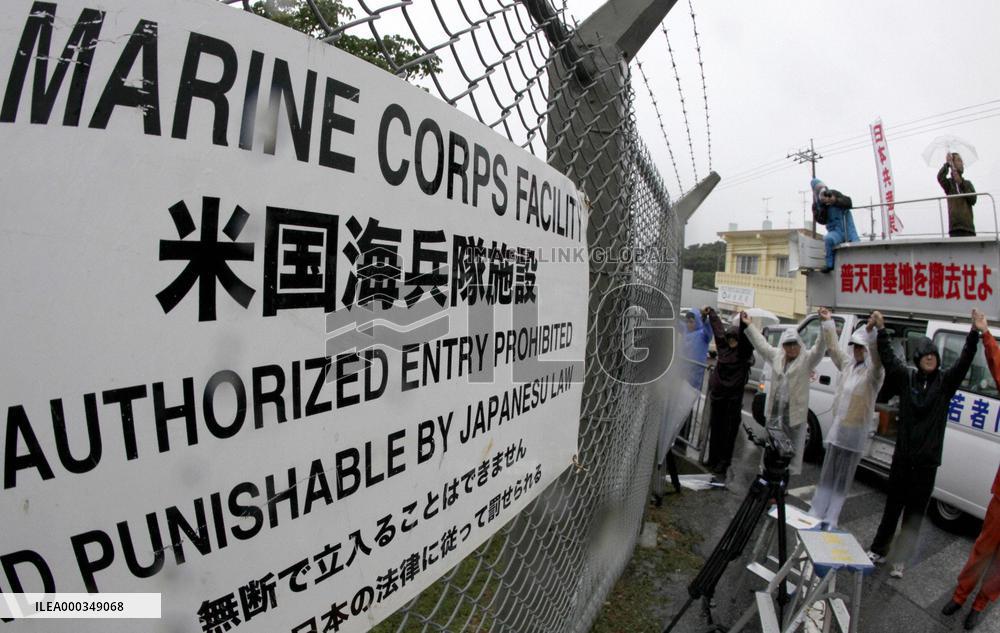 17,000 people encircle Futemma base in 'human chain'