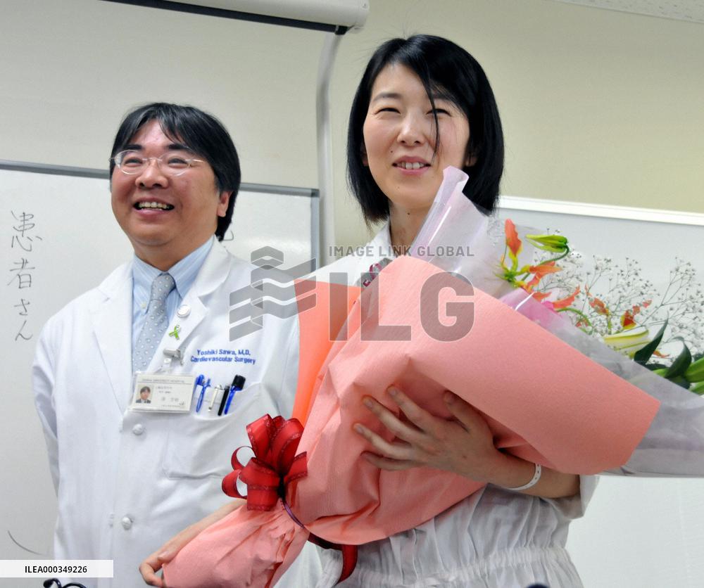 Woman with 2 artificial hearts