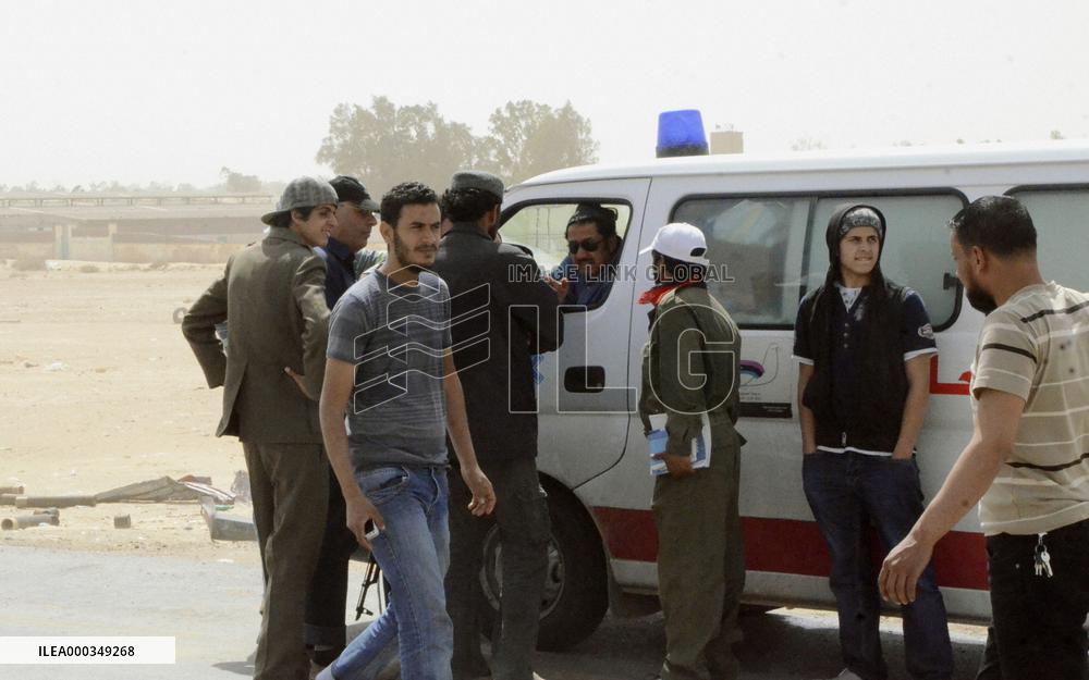 Exiled Libyans back home to fight Gaddafi